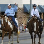 President Bob Davies & daughter Katie ride in the parade