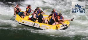 A poster that says "Sage Canyon Rafting" showing a group of people rafting down a river