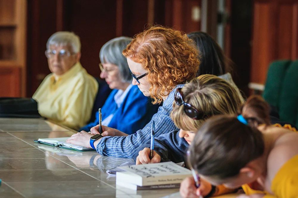 EOU MFA Student take notes at the Oaks Craft lecture 2019