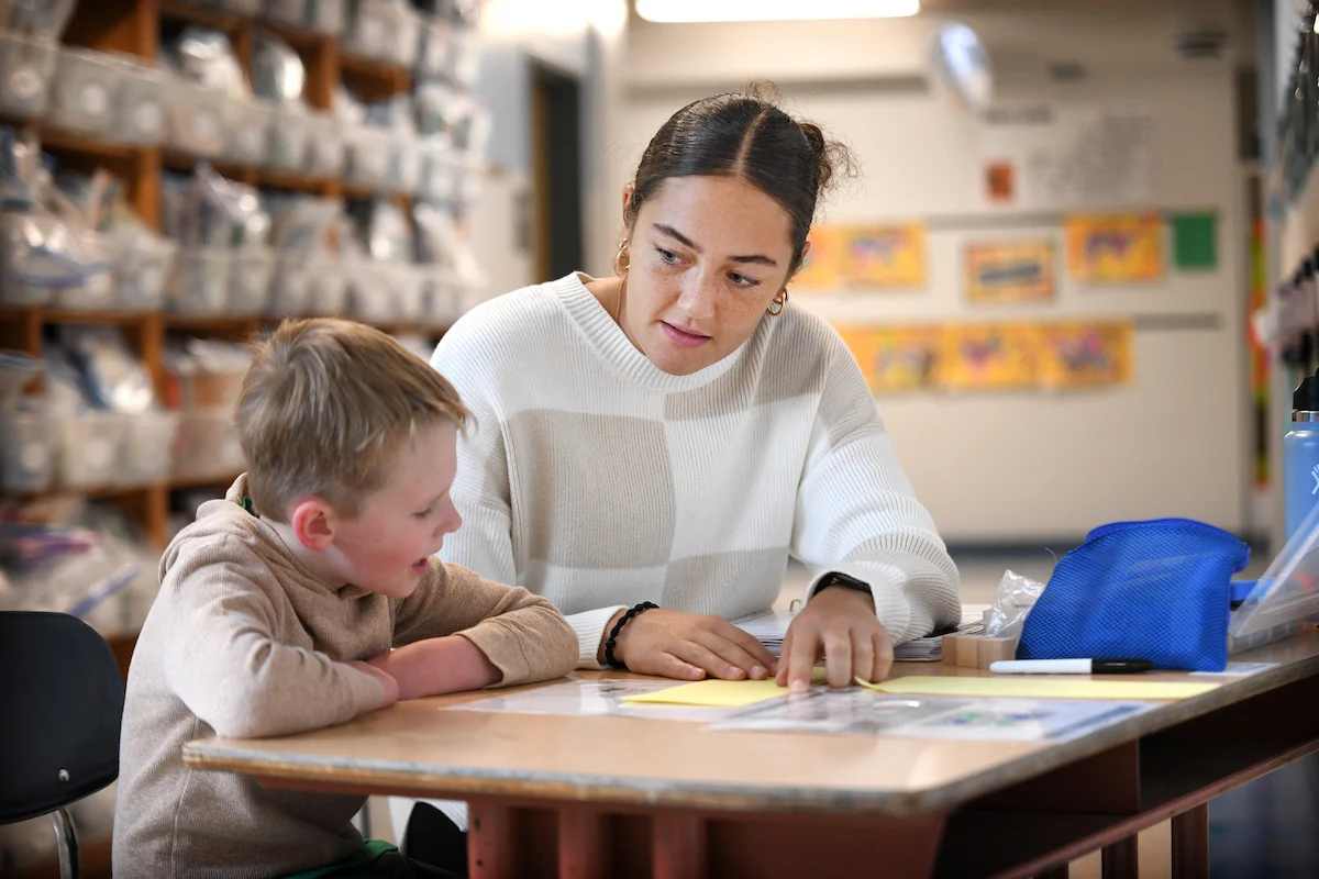 Eastern Oregon University students tutor children at Greenwood Elelmentary School in La Grande.