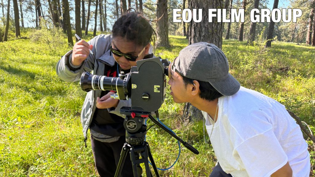 Nygma Moses (Focus Puller) and Baron Ucharm (Camera Operator) on-location, preparing a shot on The Tree.
