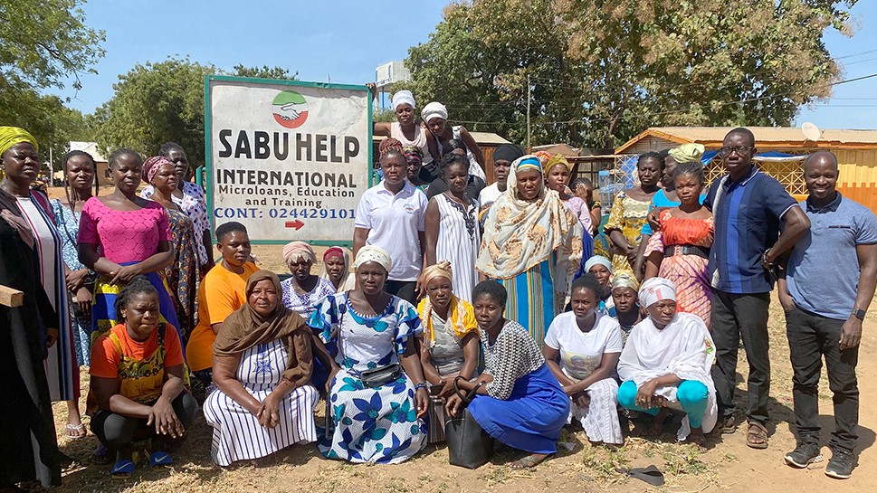 EOU alum Doctor Abio Ayeliya (far right), '08, gives back to his childhood village in Ghana. (Submitted photo.)