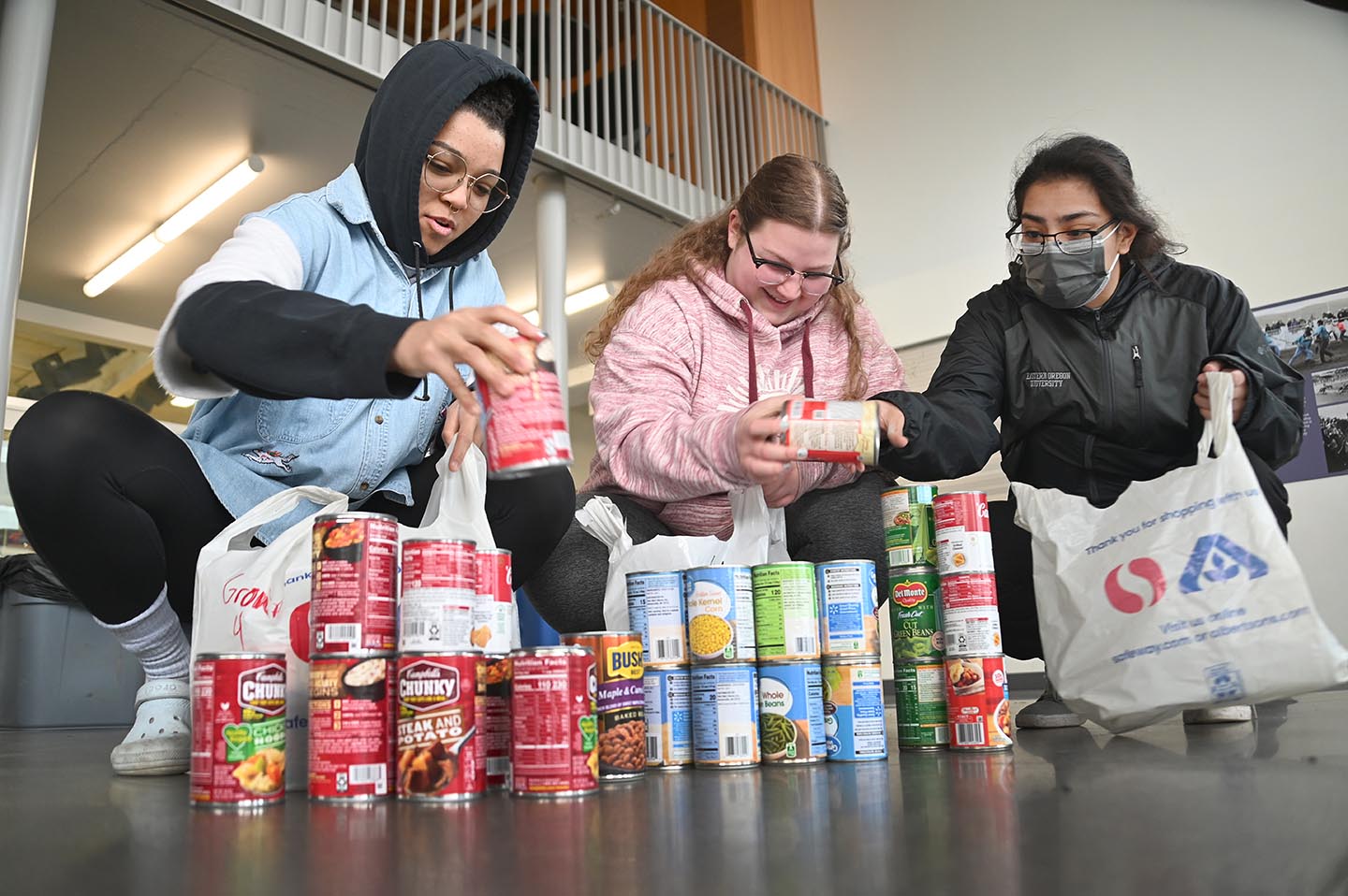 Students doing food inventory at the food drive