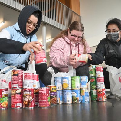 Students doing food inventory at the food drive