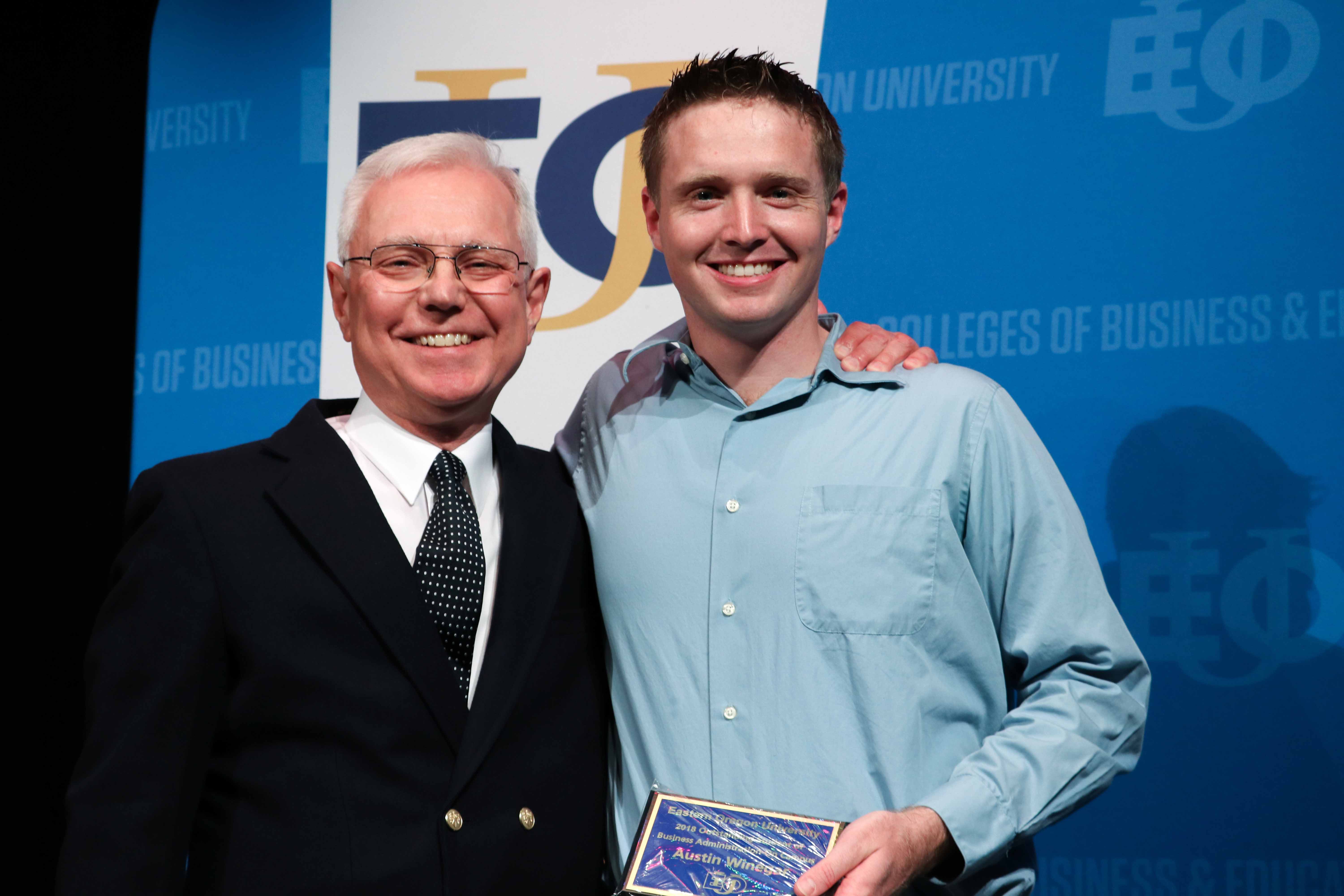 Professor Gary Keller with Austin Winegar Office of the Provost