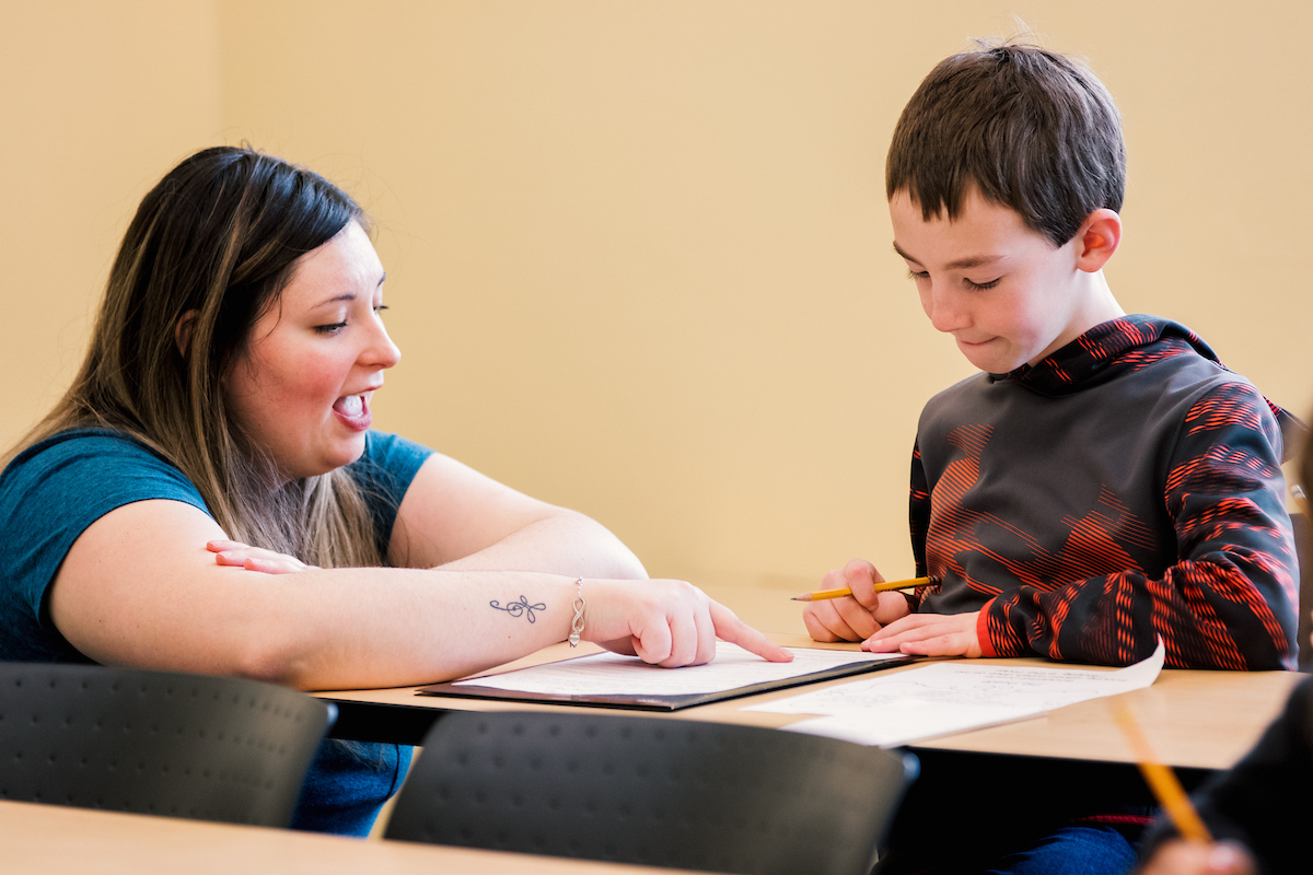 An EOURC Mentor with a student