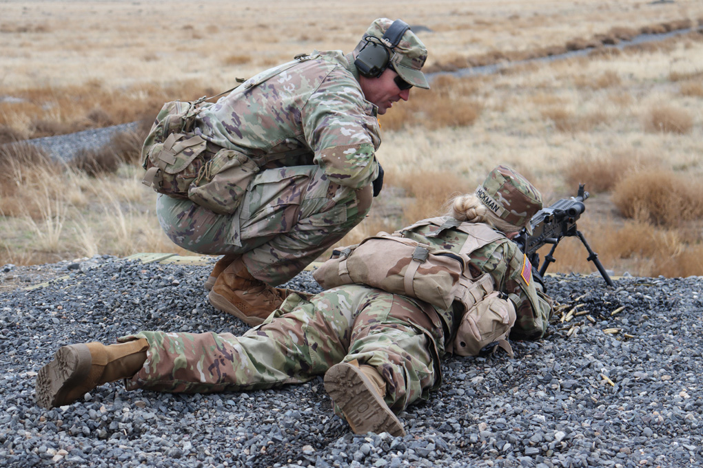 Cadet firing an M240 Machine Gun during the Field Training Exercise