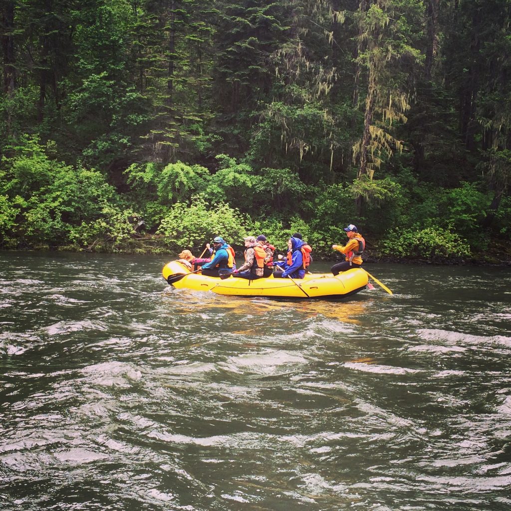 A paddle raft of EOU students float along the Grande Ronde River on the OUT 180 Whitewater Rafting course. 