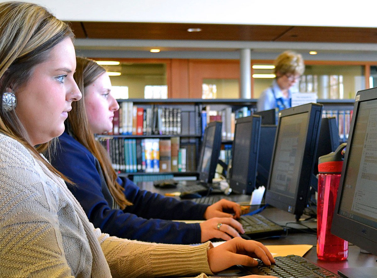 Photo by Dillon Starr / Marta Stangel and Stephanie George use Pierce Library's new search tool that provides easier access to more information.