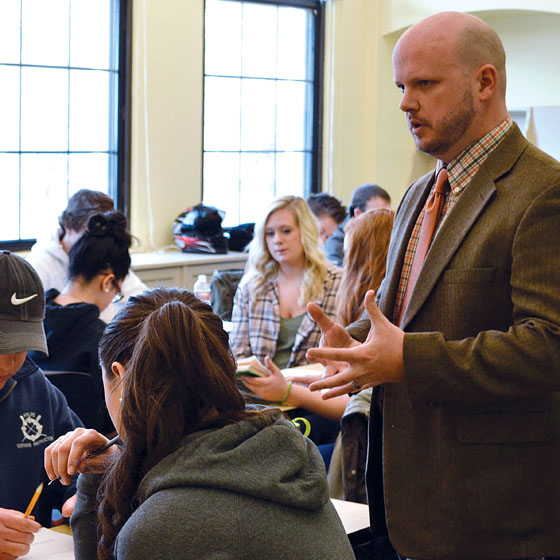 Photo by Dillon Starr / Scott McConnell, assistant professor of economics, teaches the class that participated in a live webinar about the Federal Reserve System.