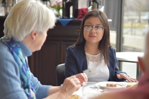 A student and donor converse at Tea & Trumpets 2018