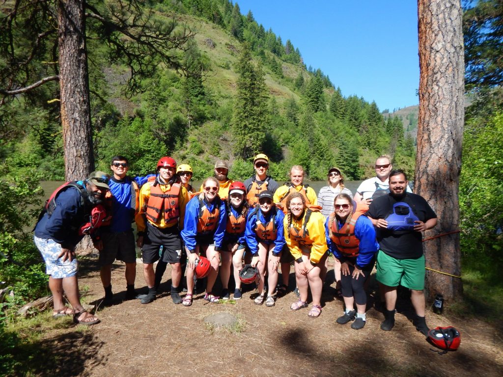 Whitewater rafting class poses for a group picture along the Grande Ronde