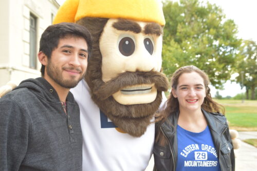 Picture of EOU mascott Monty the mountaineer with Alex and Meaghan
