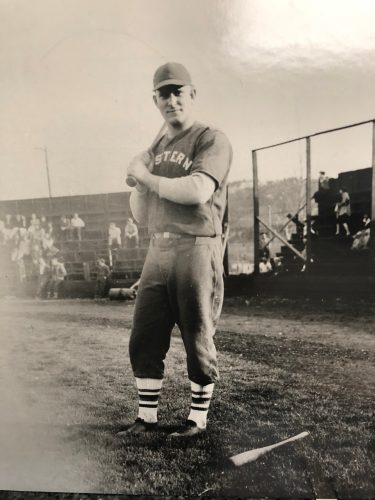 EOU Alumni Denver Ginsey poses at a baseball game