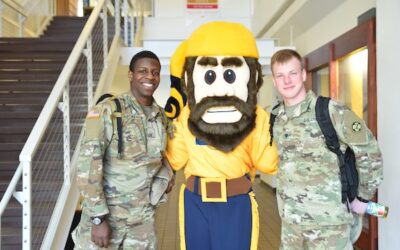 Monty mascot with ROTC students