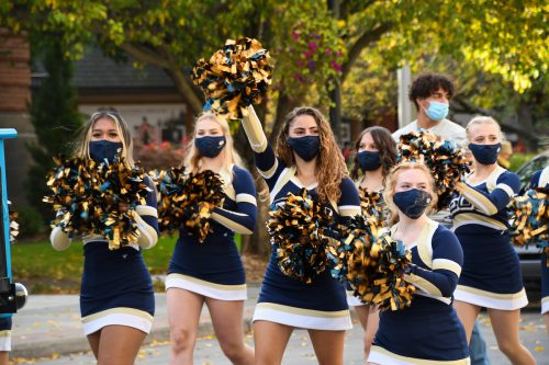 EOU cheerleaders in a parade