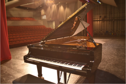 Piano on stage at McKenzie Theater