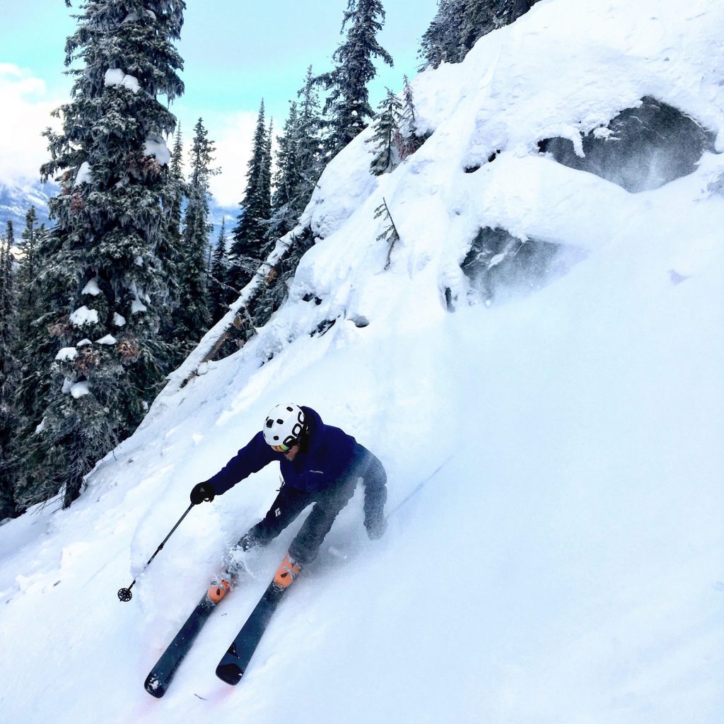 A skier making turns on the slopes and representative of skills learned when taking the OUT 180 Advanced Skiing course. 