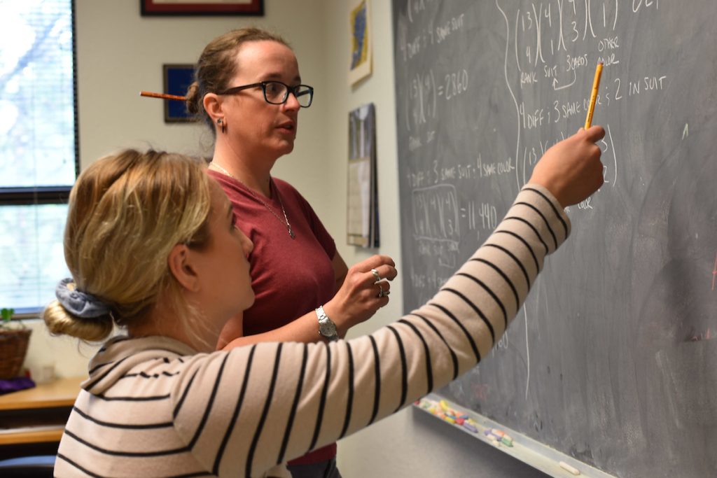 Math student with Faculty member
