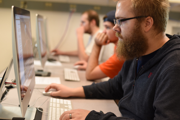 Students in the Mac Lab working on Computer Science program assignments