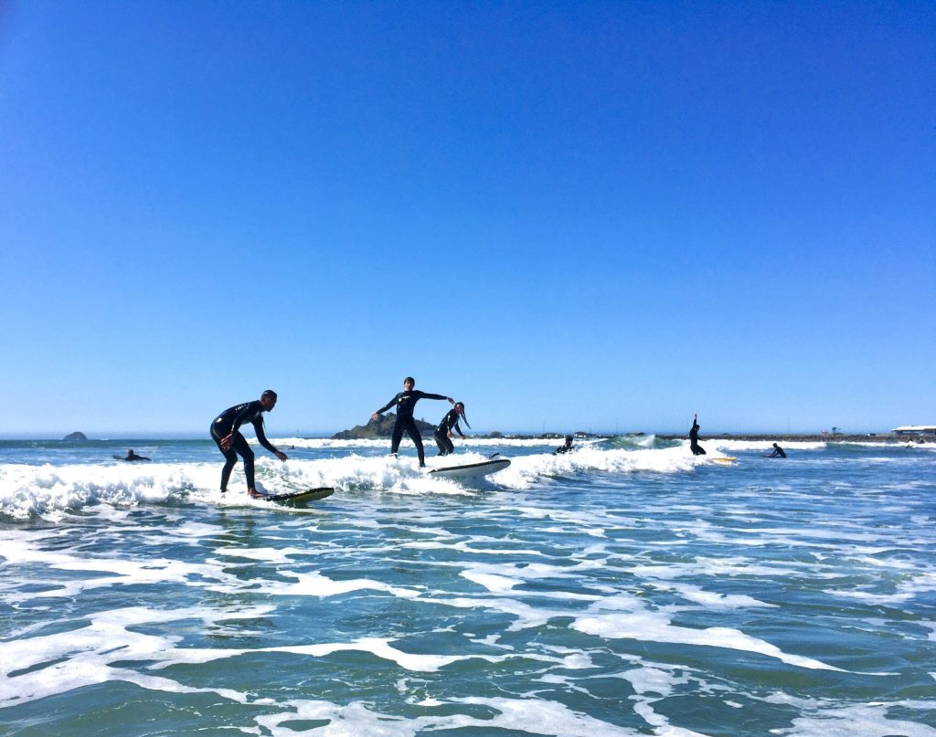 EOU students surfing at the Oregon Coast for the OUT 180 Surfing course. 