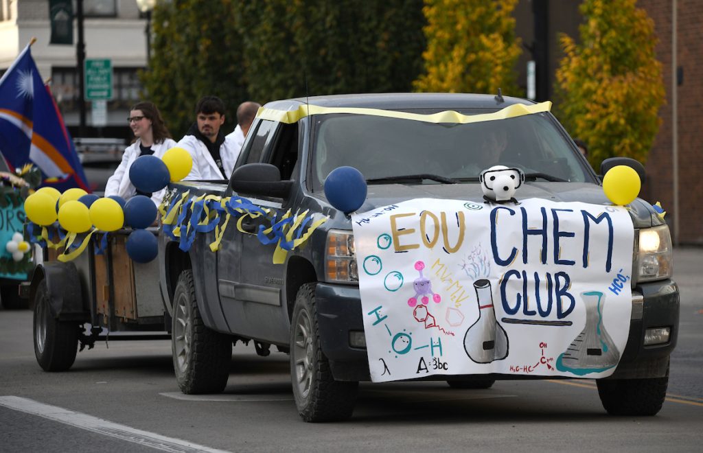 Truck with a label for the EOU chemistry club in a parade