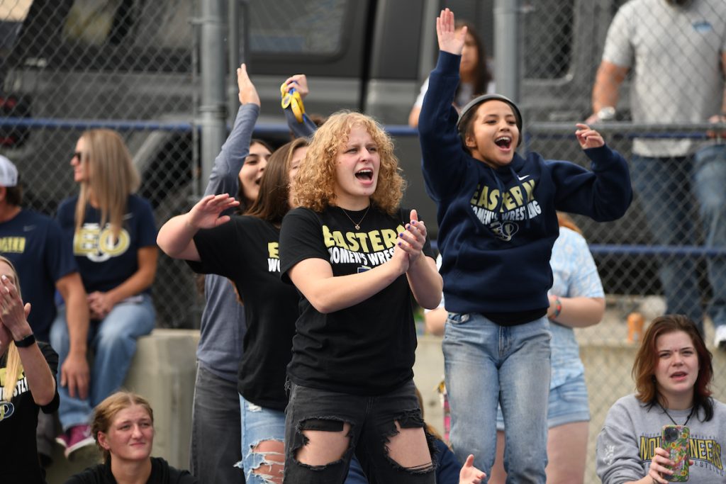 EOU Students cheering at an athletic event