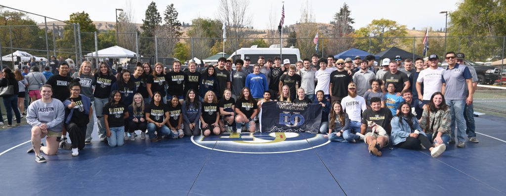 Large group of EOU students posing on campus