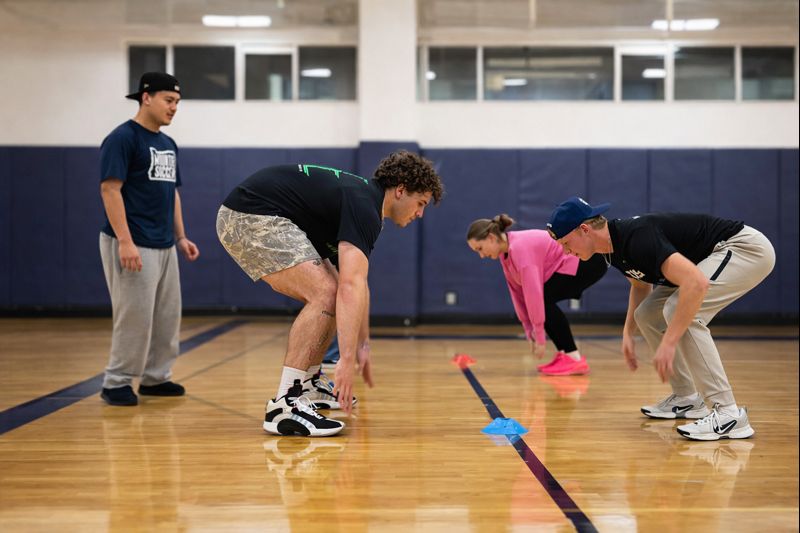 EOU Athletes working out in the gym