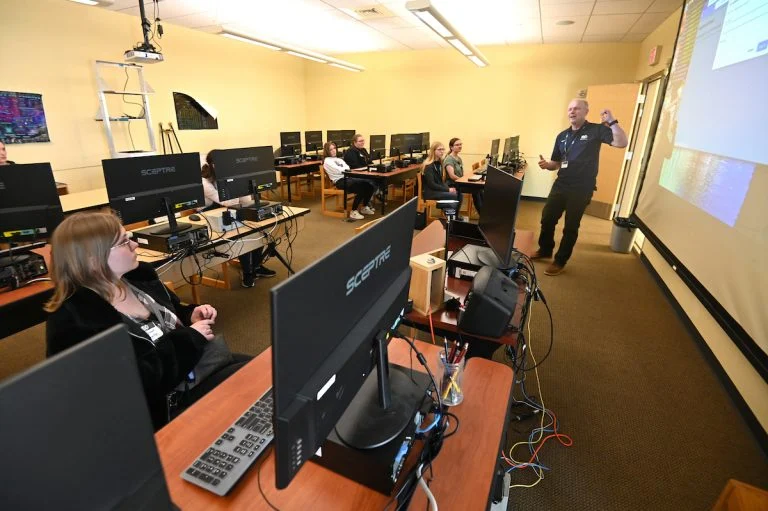 Computer science faculty teaching students in the Linux lab at EOU